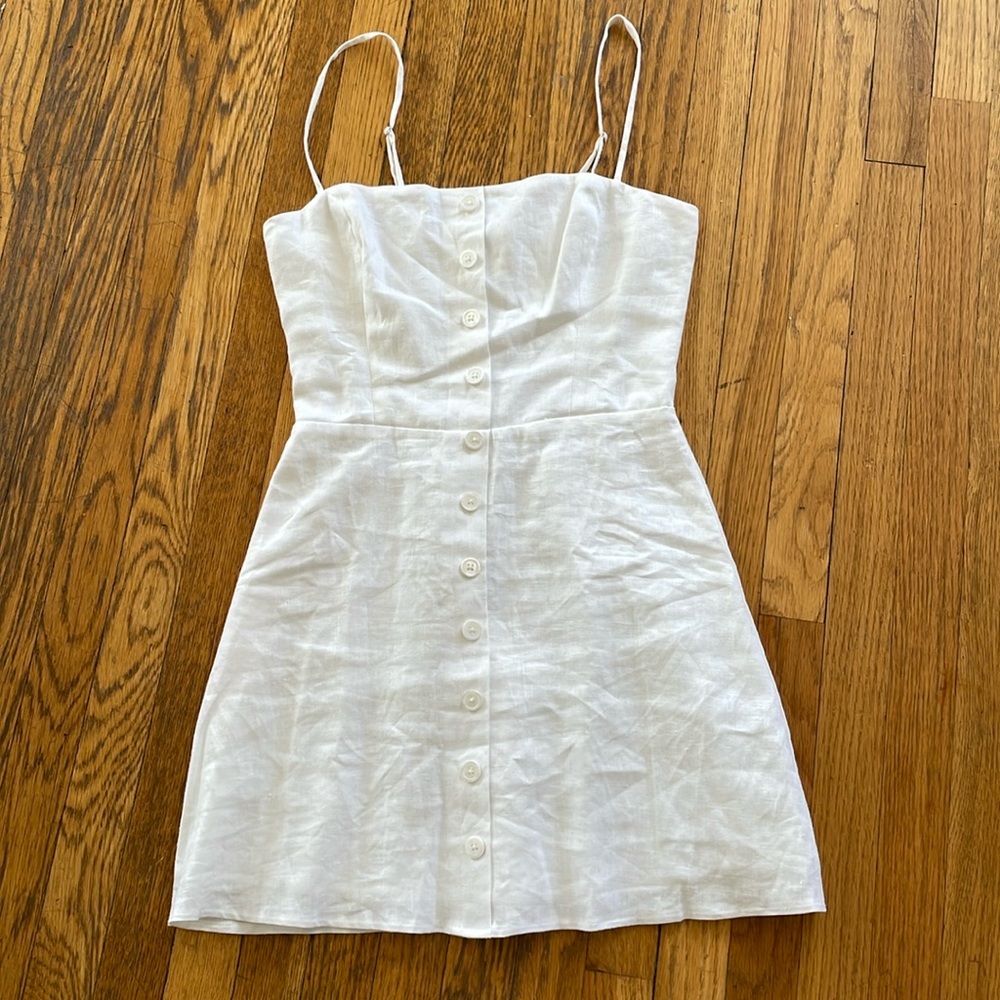 NWOT Reformation white linen dress. Spaghetti straps, buttons down the middle.